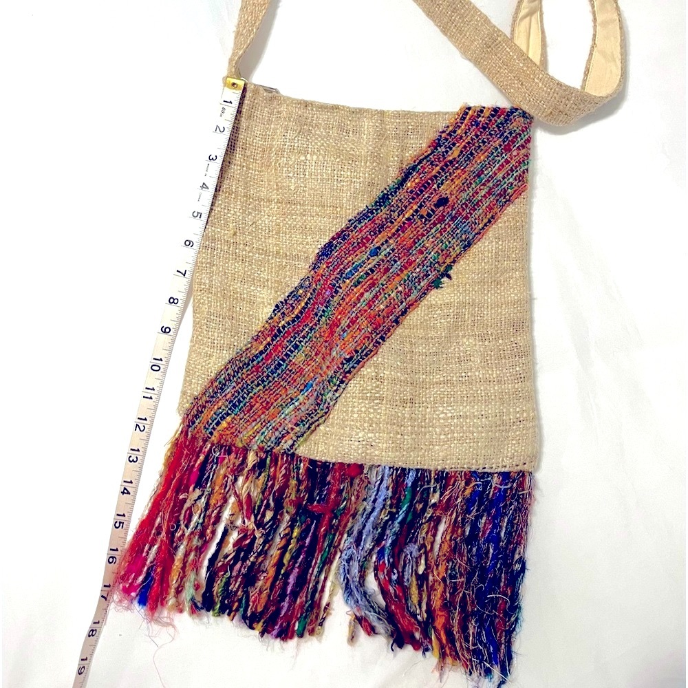 Hemp crossbody handbag with rainbow colored décor and fringed bottom